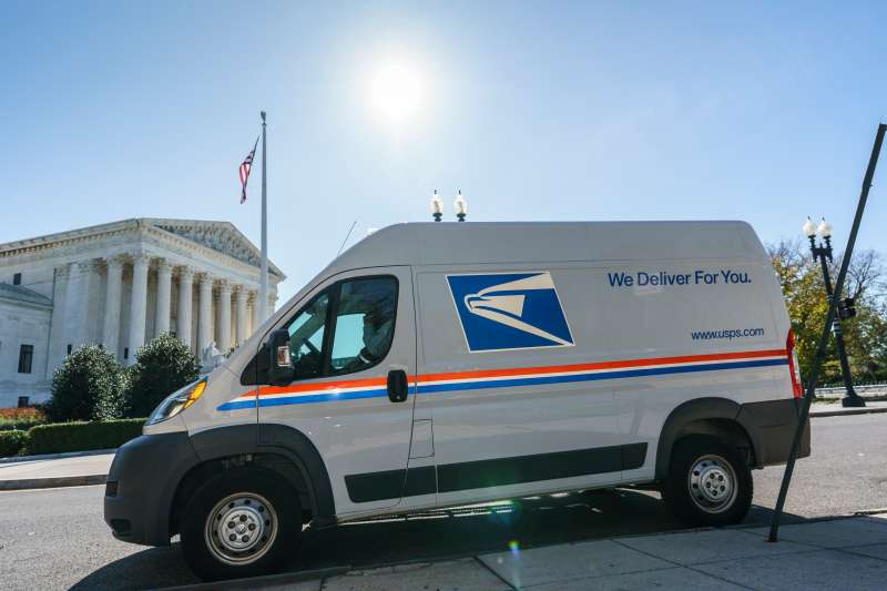 A U.S. Postal Service truck makes deliveries next to the Supreme Court on Election Day, Tuesday, Nov. 3, 2020, in Washington.