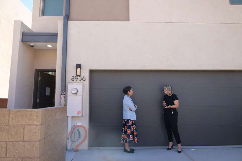 New Mexico Democratic gubernatorial nominee Deb Haaland, left, on Aug. 27, 2026, speaks to Veronica Toledo, Homewise’s director of policy and advocacy, during a tour of a new Albuquerque affordable housing development, which developers said benefited from state subsidies and quick local permitting. (Patrick Lohmann/Source NM)