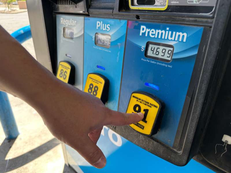 A customer opts for premium grade fuel at a tribally owned gas station near Sandia Pueblo, New Mexico.